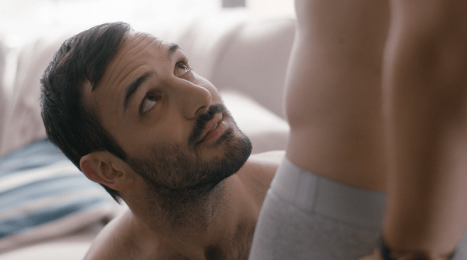 Still from the new gay series Interested In - Now Available on Dekkoo!