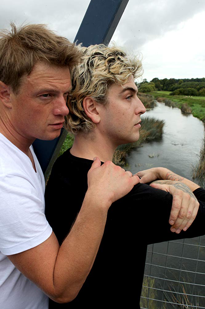 Wade Radford and Robbie Manners in Caught in a Landslide