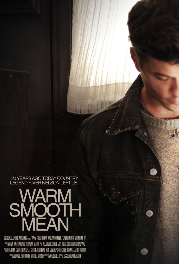 A man looking down, wearing a dark denim jacket, with soft light coming through a window in the background. The image features text that reads '20 YEARS AGO TODAY COUNTRY LEGEND RIVER NELSON LEFT US... WARM SMOOTH MEAN'.