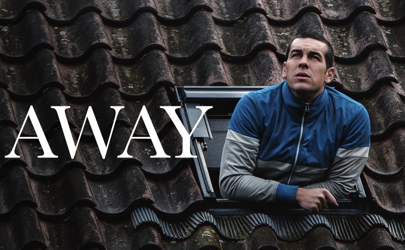 AWAY movie poster featuring Mario Casas looking out from a rooftop window.