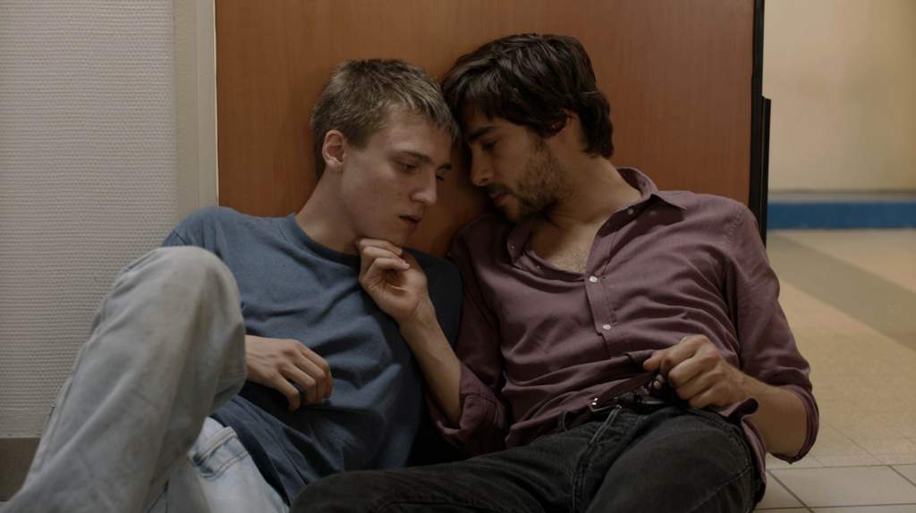Martin and Dominique share an intimate moment in the gay short film 1992
