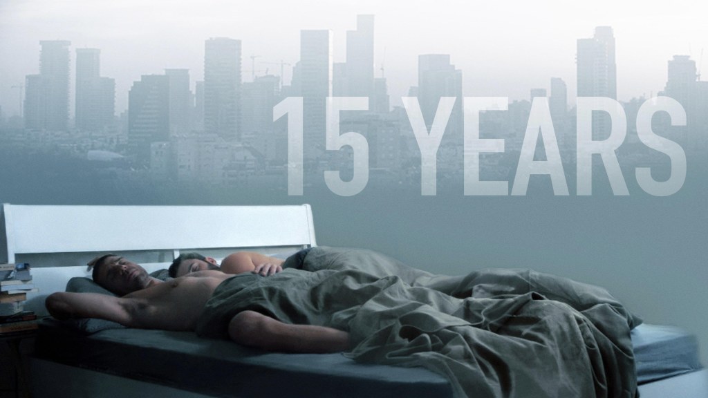 Yoav and Dan in bed overlooking Tel Aviv in the gay drama 15 Years