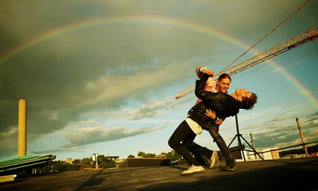Sebastian and Andreas together beneath a rainbow in Something Must Break