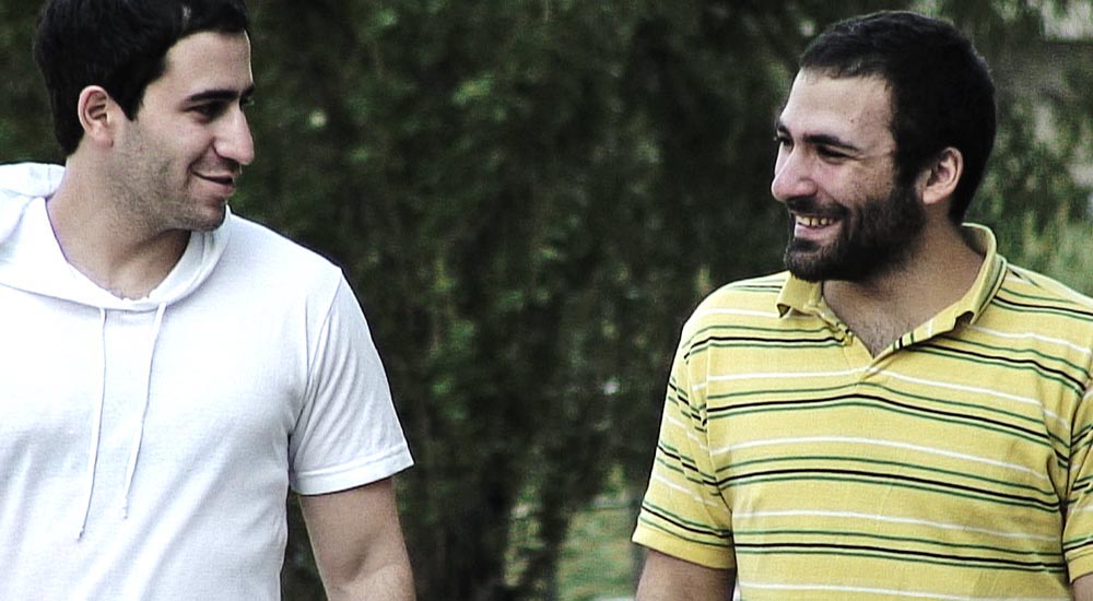 Cibrâil and Marco together in the gay drama The Visitor