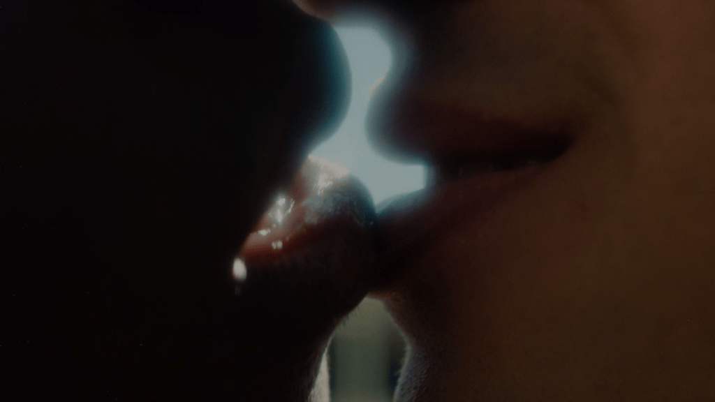 Frank Onana as Youssou and Adam Hafsia as Malek sharing a tender moment in Youssou & Malek
