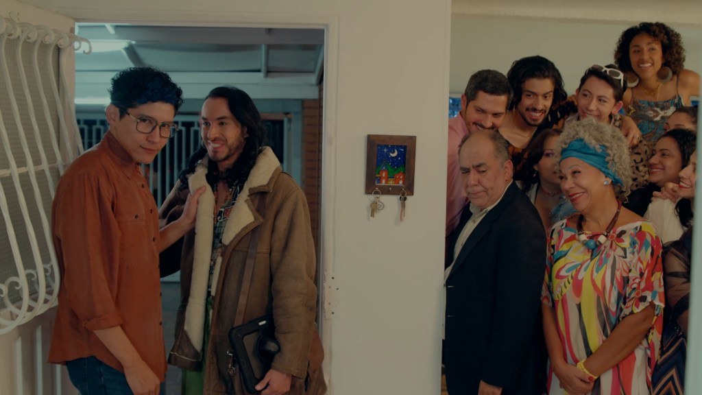 Germán Andrés with friends and family in the gay comedy series Playing Around