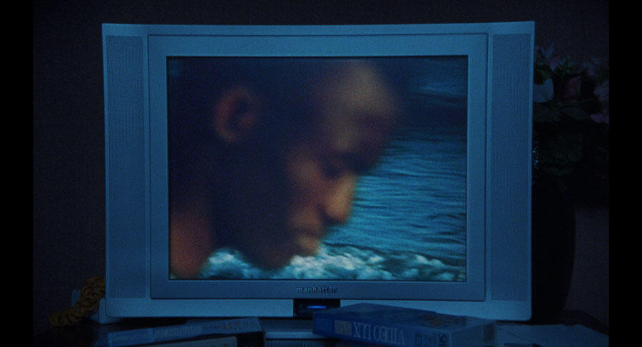 VHS footage playing on a television in Valentin Noujaïm's queer short film Oceania