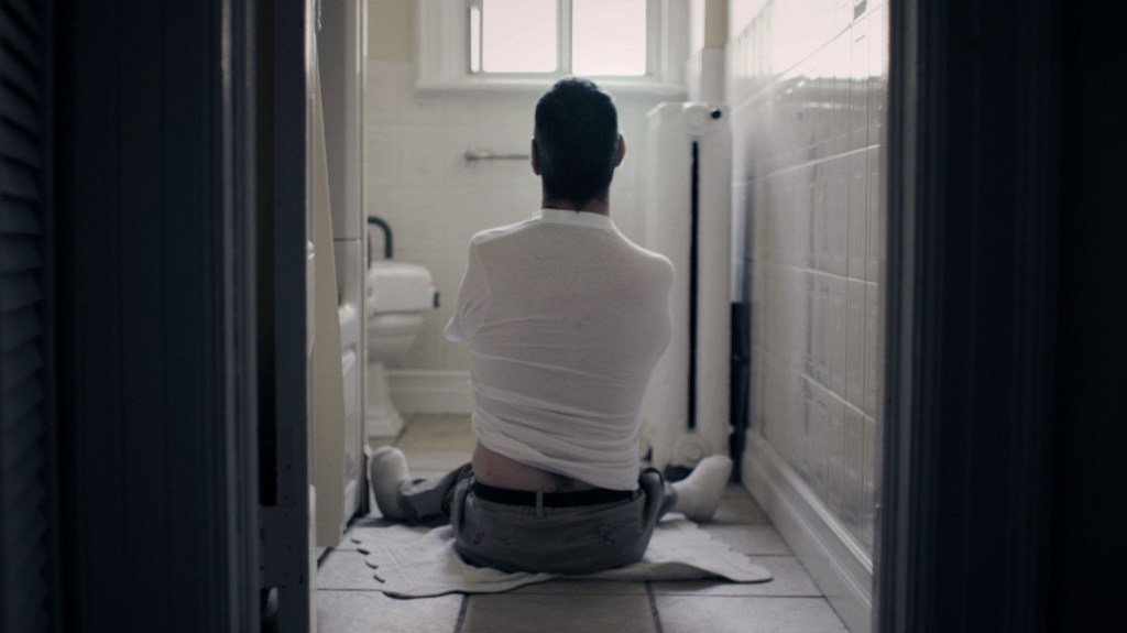 Scene from Hole, an award-winning gay short film about intimacy and disability streaming on Dekkoo