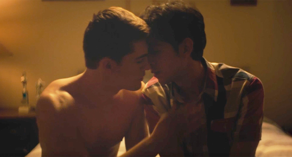 Two young men share an intimate moment in the queer horror film Ganymede