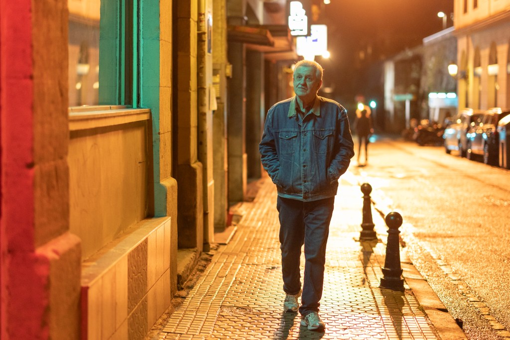 Vicente walks alone at night in Maspalomas, the acclaimed gay drama on Dekkoo