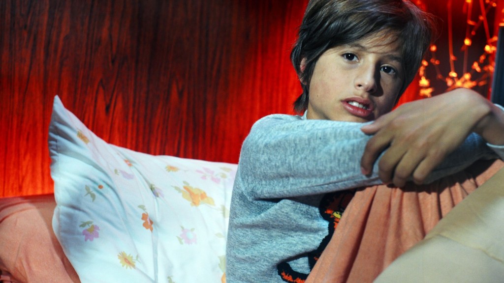 Young boy in a scene from Wild Tigers I Have Known, the Sundance-selected queer coming-of-age film streaming on Dekkoo